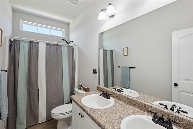 105 Summer Station Dr, Guyton, GA 31312 - bathroom featuring double vanity, curtained shower, and tile patterned flooring