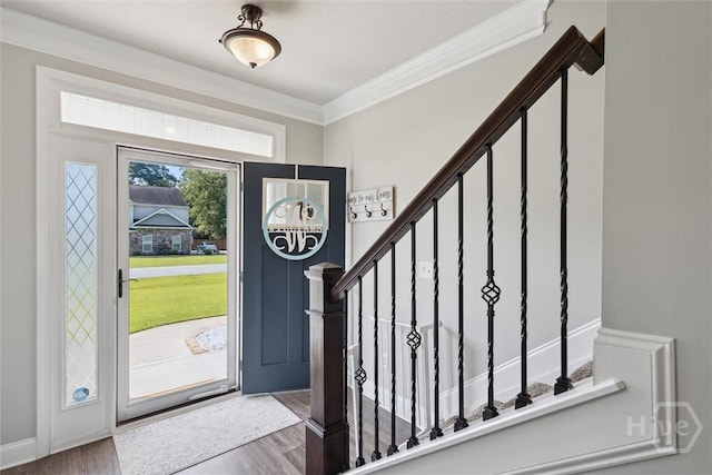 105 Summer Station Dr, Guyton, GA 31312 - entryway with stairs, ornamental molding, and wood finished floors