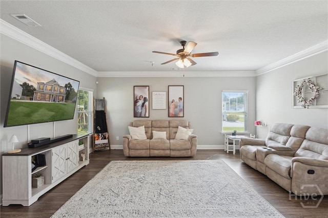 105 Summer Station Dr, Guyton, GA 31312 - living room featuring plenty of natural light, ceiling fan, crown molding, and dark wood-style flooring