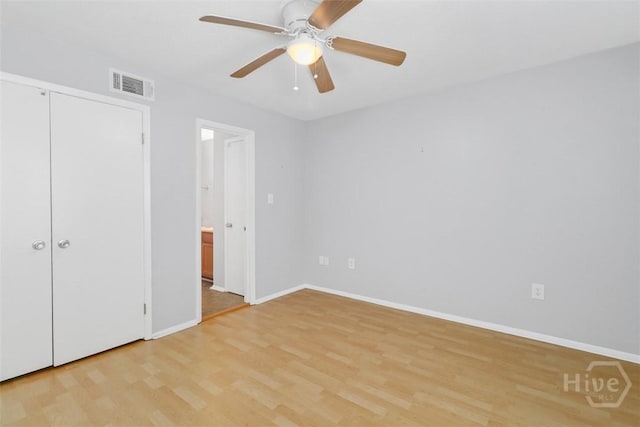 401 N Cromwell Rd Unit Q2, Savannah, GA 31410 - unfurnished bedroom featuring light wood-type flooring, ceiling fan, and ensuite bath