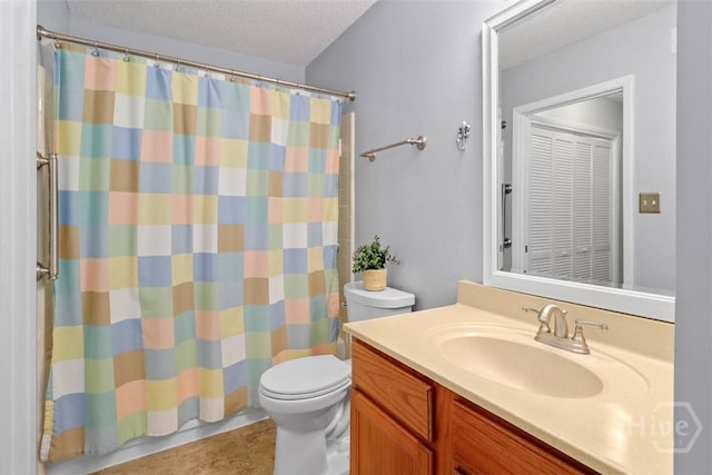 401 N Cromwell Rd Unit Q2, Savannah, GA 31410 - bathroom with vanity, tile patterned floors, curtained shower, and a textured ceiling
