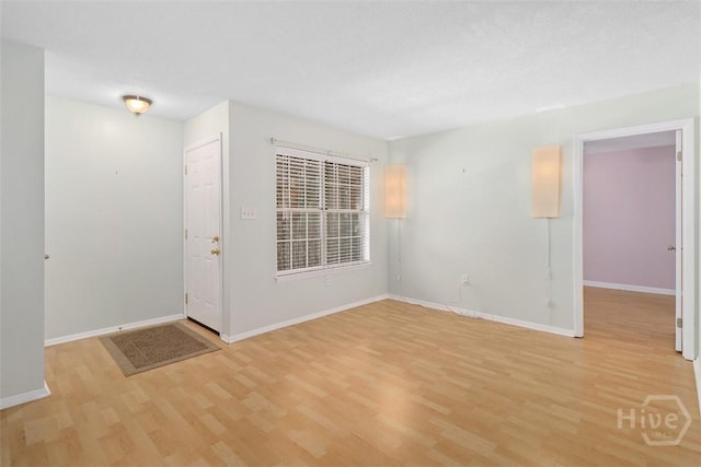 401 N Cromwell Rd Unit Q2, Savannah, GA 31410 - unfurnished room with light wood-type flooring and baseboards