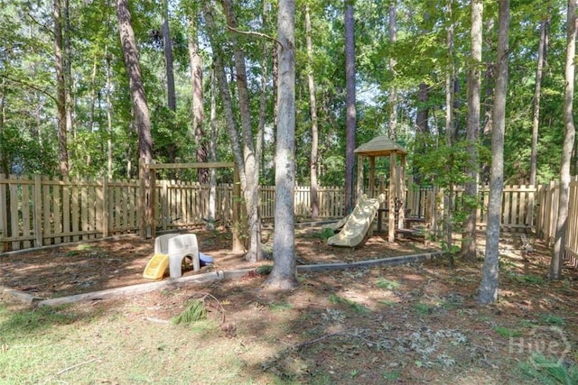 401 N Cromwell Rd Unit Q2, Savannah, GA 31410 - fenced backyard with a playground
