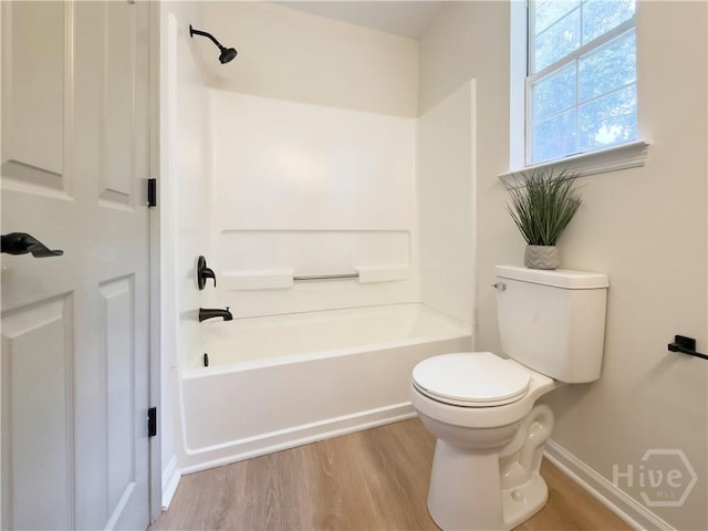 7231 Grant St, Savannah, GA 31406 - bathroom with wood finished floors and washtub / shower combination