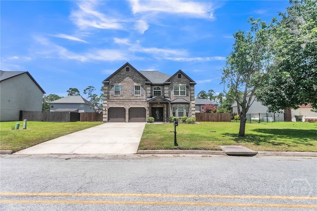 804 Barrington Dr, Hinesville, GA 31313 - view of front of property with stone siding, driveway, and an attached garage
