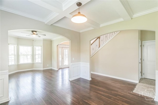 804 Barrington Dr, Hinesville, GA 31313 - foyer entrance with arched walkways, ceiling fan, beamed ceiling, dark wood-style floors, and coffered ceiling