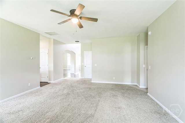 804 Barrington Dr, Hinesville, GA 31313 - empty room with a ceiling fan, carpet, and arched walkways