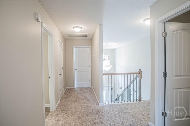 804 Barrington Dr, Hinesville, GA 31313 - hallway with carpet and an upstairs landing