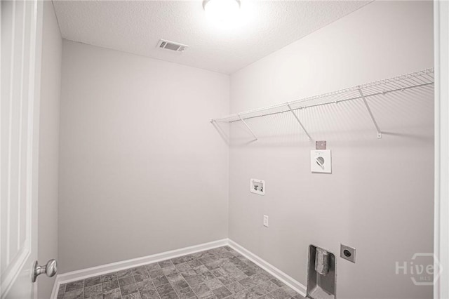 804 Barrington Dr, Hinesville, GA 31313 - laundry area featuring hookup for an electric dryer, washer hookup, and a textured ceiling