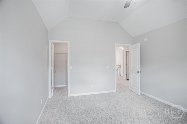 804 Barrington Dr, Hinesville, GA 31313 - unfurnished bedroom featuring a spacious closet, light colored carpet, vaulted ceiling, and a ceiling fan