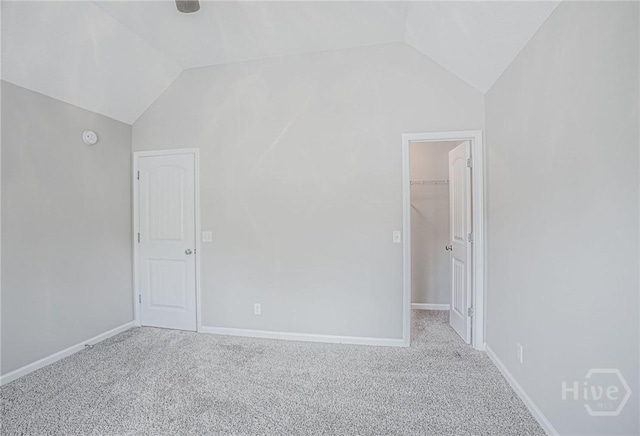 804 Barrington Dr, Hinesville, GA 31313 - unfurnished bedroom featuring lofted ceiling, carpet floors, a spacious closet, and a closet