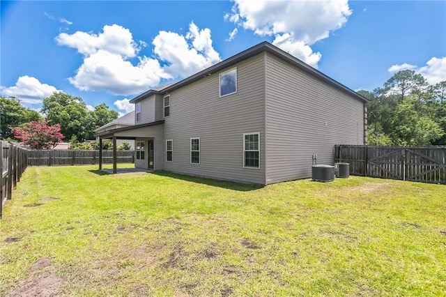 804 Barrington Dr, Hinesville, GA 31313 - rear view of house with a fenced backyard and a patio