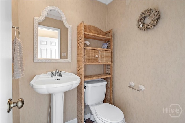 12502 Apache Ave Unit 18, Savannah, GA 31419 - bathroom featuring toilet and a sink