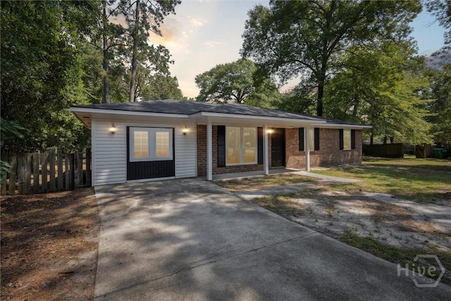 1021 Walnut Ct, Springfield, GA 31329 - ranch-style home with concrete driveway and brick siding