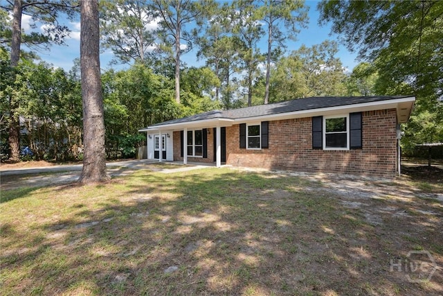 1021 Walnut Ct, Springfield, GA 31329 - single story home with french doors, brick siding, and a front yard