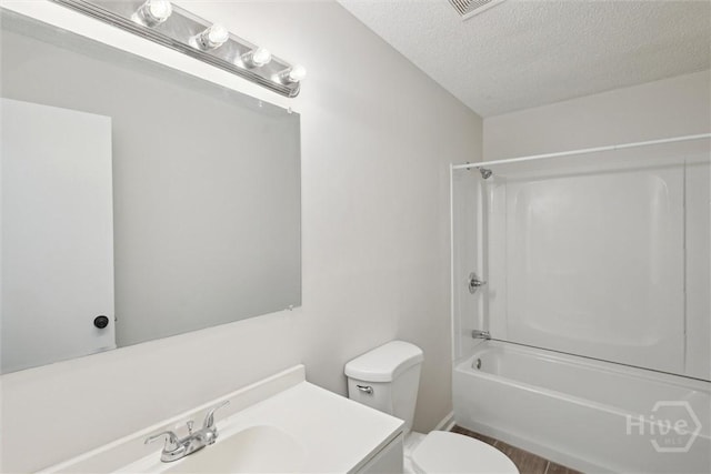 1021 Walnut Ct, Springfield, GA 31329 - bathroom with a textured ceiling, vanity, and shower / bathtub combination