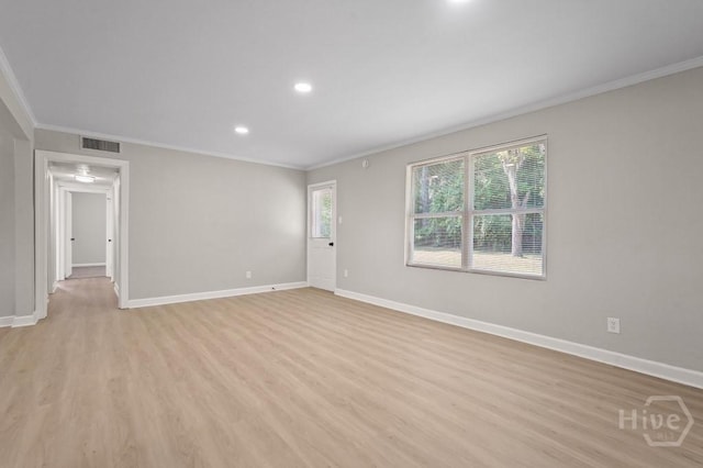 13 Hughes Ave, Savannah, GA 31406 - spare room with ornamental molding, light wood-style flooring, and recessed lighting
