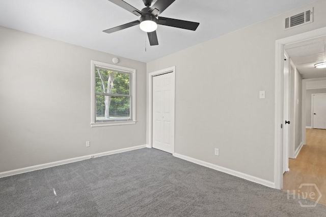 13 Hughes Ave, Savannah, GA 31406 - unfurnished bedroom featuring a closet, carpet floors, attic access, and ceiling fan