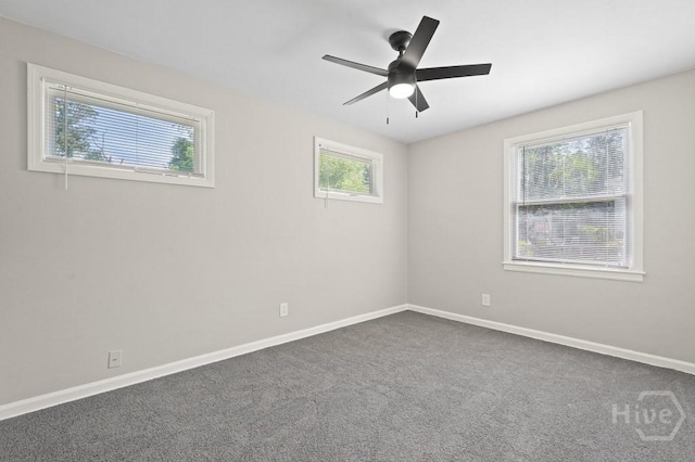 13 Hughes Ave, Savannah, GA 31406 - empty room with dark colored carpet and ceiling fan