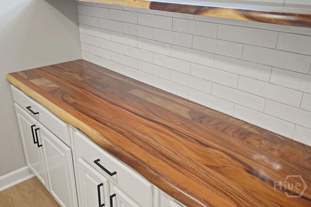 13 Hughes Ave, Savannah, GA 31406 - detailed view of baseboards and wood finished floors