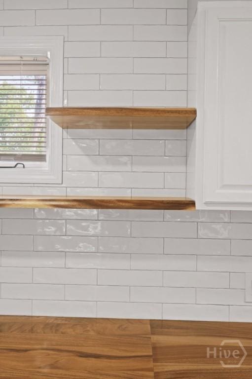 13 Hughes Ave, Savannah, GA 31406 - kitchen view of tasteful backsplash and white cabinets