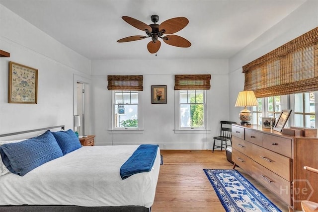 1226 E 50th St, Savannah, GA 31404 - bedroom with light wood-style flooring and baseboards