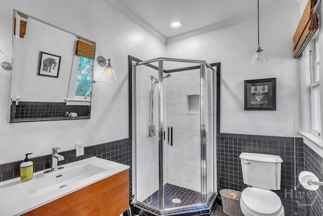 1226 E 50th St, Savannah, GA 31404 - full bath with tile walls, vanity, a stall shower, crown molding, and a wainscoted wall