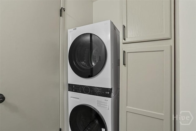 109 E Tietgen St, Pooler, GA 31322 - washroom featuring estacked washer and dryer and cabinet space