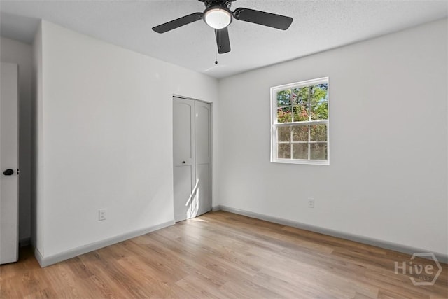109 E Tietgen St, Pooler, GA 31322 - unfurnished bedroom featuring light wood-type flooring, a closet, and ceiling fan