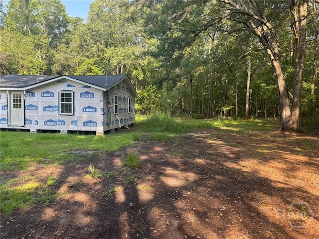156 Diamond Ln, Midway, GA 31320 - view of home's exterior with a view of trees