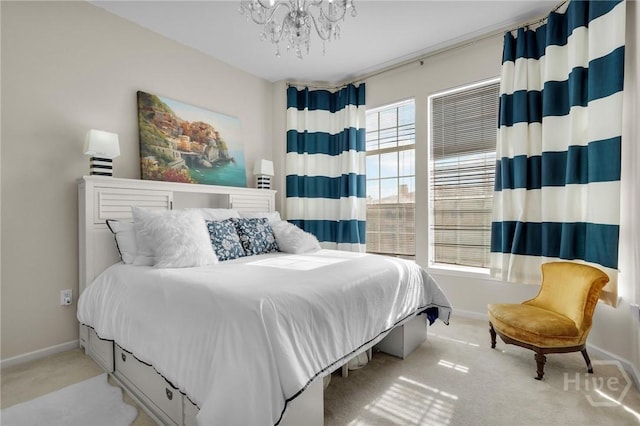 1312 Whitemarsh Way, Savannah, GA 31410 - bedroom with a chandelier and light carpet