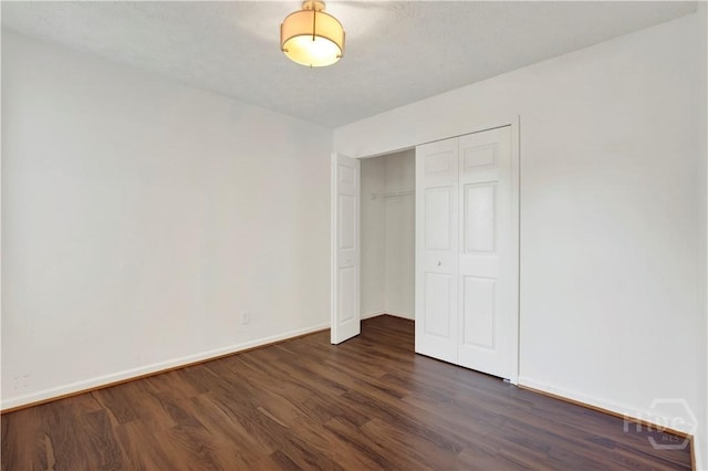 106 Dry Dock Ct, Savannah, GA 31410 - unfurnished bedroom featuring dark wood-style floors and a closet
