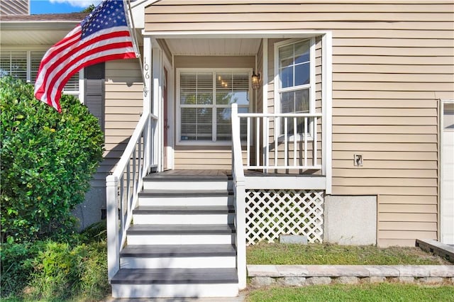 106 Dry Dock Ct, Savannah, GA 31410 - doorway to property featuring covered porch