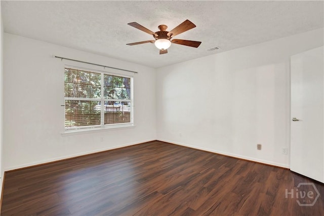 106 Dry Dock Ct, Savannah, GA 31410 - empty room featuring dark wood-style flooring, ceiling fan, and a textured ceiling