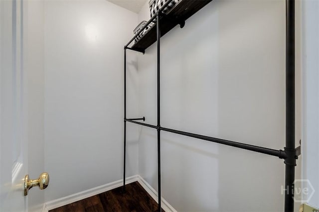 86 Fellwood Dr, Rincon, GA 31326 - spacious closet featuring dark wood finished floors