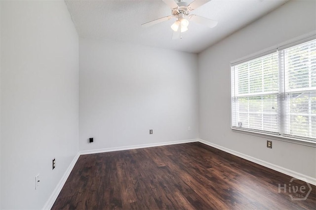 86 Fellwood Dr, Rincon, GA 31326 - empty room with dark wood finished floors and ceiling fan