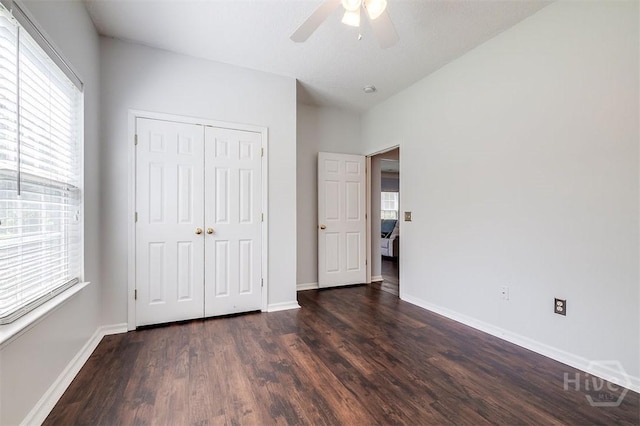 86 Fellwood Dr, Rincon, GA 31326 - unfurnished bedroom with dark wood-style flooring, a closet, and ceiling fan