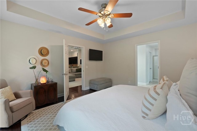 22 Carriage Way, Midway, GA 31320 - bedroom with a raised ceiling and ceiling fan