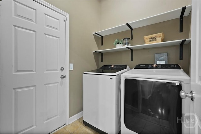 22 Carriage Way, Midway, GA 31320 - washroom featuring washing machine and dryer and light tile patterned floors