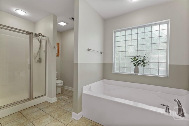 22 Carriage Way, Midway, GA 31320 - full bath featuring a garden tub, a shower stall, and tile patterned flooring