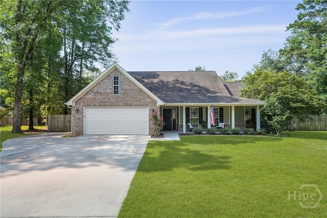 22 Carriage Way, Midway, GA 31320 - view of front of house with a porch, concrete driveway, an attached garage, and brick siding