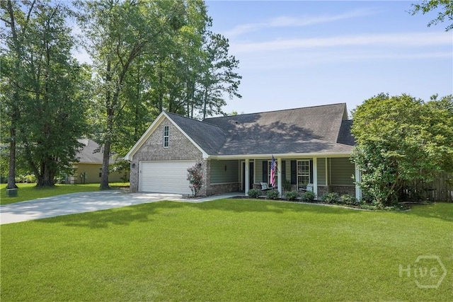 22 Carriage Way, Midway, GA 31320 - view of front facade featuring covered porch, driveway, a front yard, and a garage