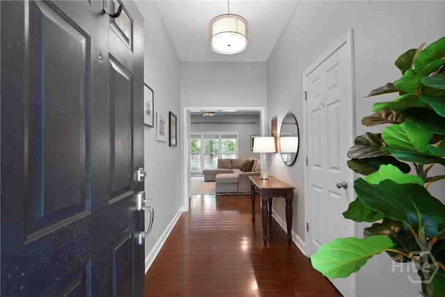 22 Carriage Way, Midway, GA 31320 - foyer entrance featuring wood finished floors and baseboards