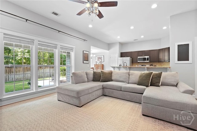 22 Carriage Way, Midway, GA 31320 - living area with a ceiling fan and recessed lighting