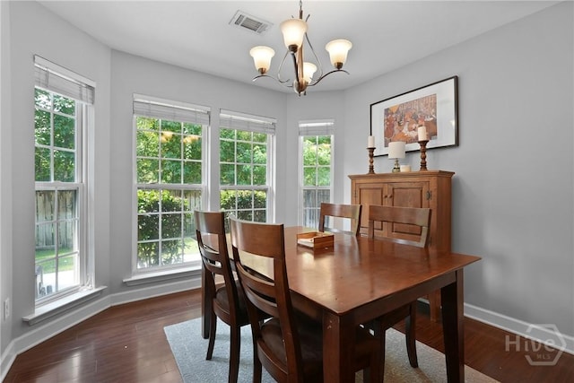22 Carriage Way, Midway, GA 31320 - dining room with a chandelier, healthy amount of natural light, and wood finished floors