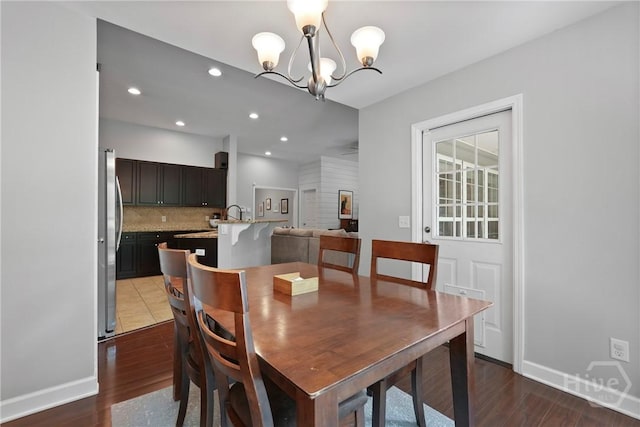 22 Carriage Way, Midway, GA 31320 - dining room with a chandelier, wood finished floors, and recessed lighting