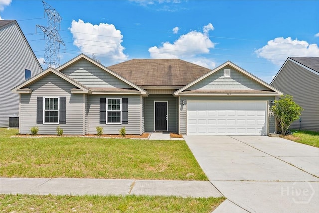 164 Whirlwind Way, Guyton, GA 31312 - view of front of house featuring an attached garage, a front yard, and driveway