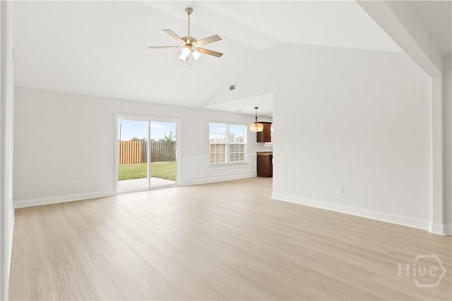 164 Whirlwind Way, Guyton, GA 31312 - unfurnished living room featuring light wood finished floors, a ceiling fan, and high vaulted ceiling