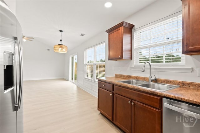 164 Whirlwind Way, Guyton, GA 31312 - kitchen with appliances with stainless steel finishes, light wood-style flooring, hanging light fixtures, recessed lighting, and ceiling fan