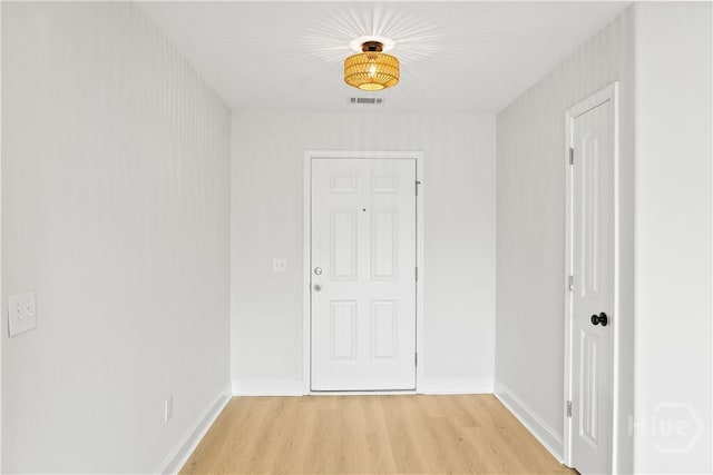 164 Whirlwind Way, Guyton, GA 31312 - hall with light wood finished floors and baseboards